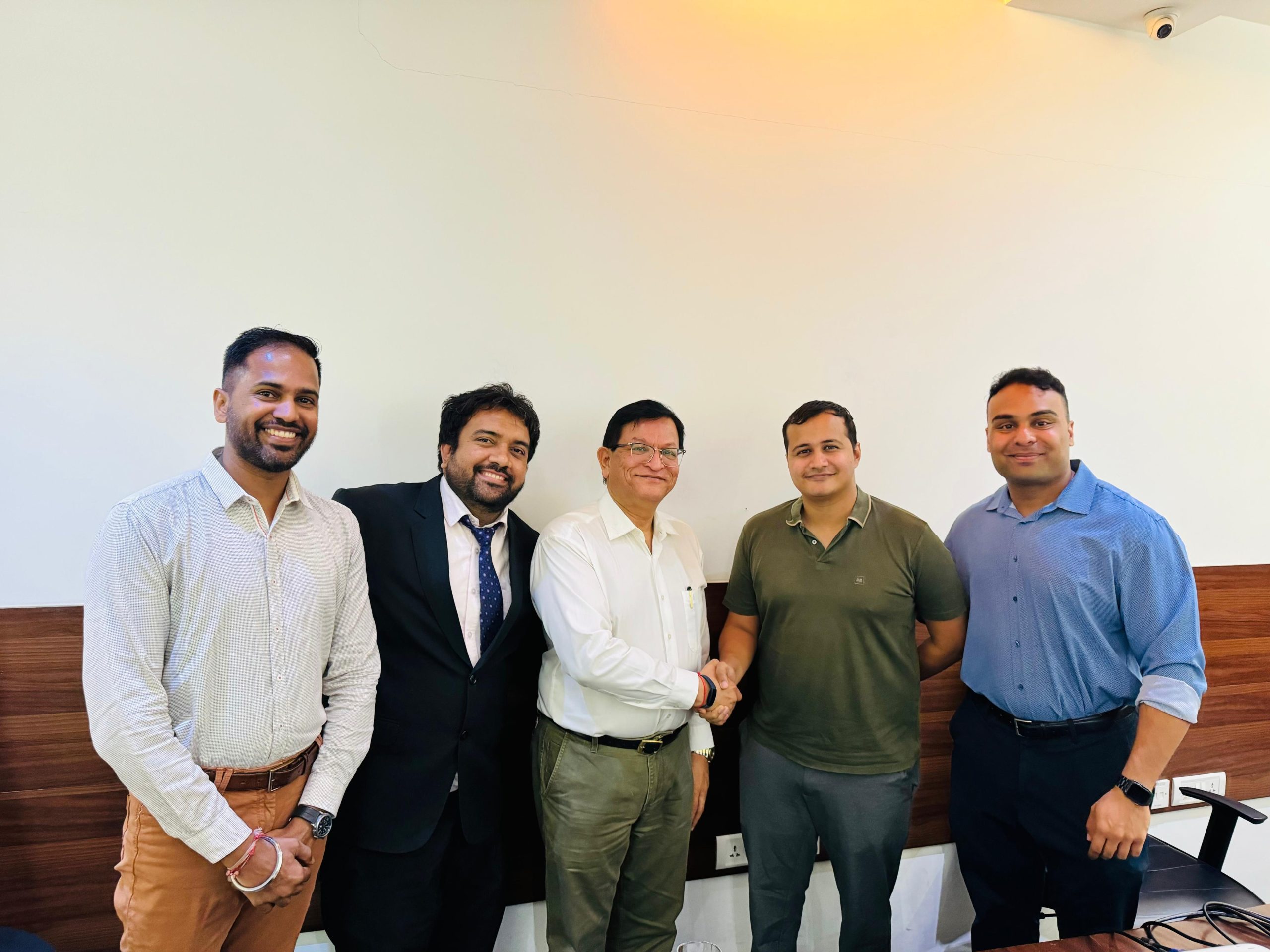 TriNANO deal handshake moment with Salil Rana and business stakeholders